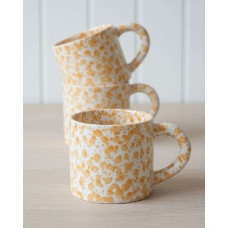 keramik mugg -orange stänkmönster